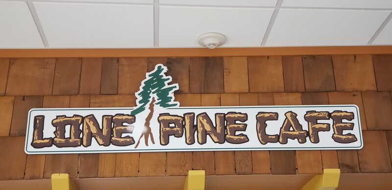This is Emphasis. The LONE PINE CAFE is the main part of this image, and the rest is just there to make it stand out.  
